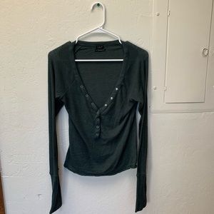 Urban Outfitters soft lowcut green button top